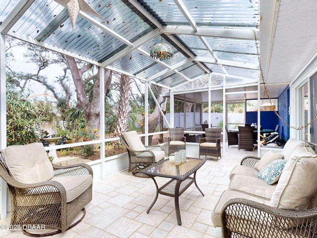 sunroom / solarium with vaulted ceiling