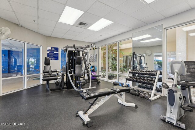 4650 Links Village Dr Unit B103, Ponce Inlet, FL 32127 - workout area featuring a paneled ceiling
