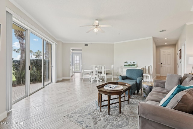 4650 Links Village Dr Unit B103, Ponce Inlet, FL 32127 - living area featuring a ceiling fan, light wood-type flooring, crown molding, and recessed lighting