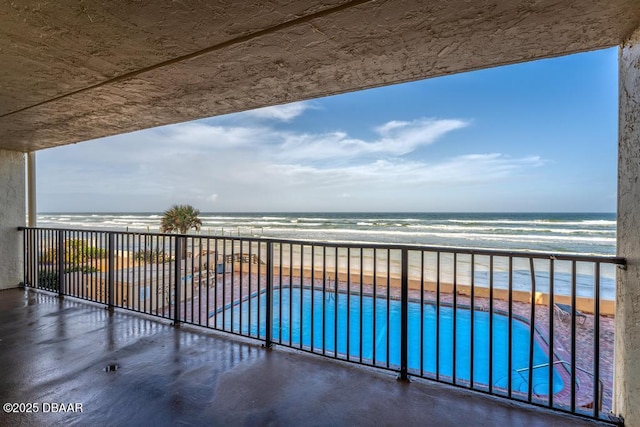 3807 S Atlantic Ave Unit 2020, Daytona Beach, FL 32118 - balcony with view of pool area and view of water and beach