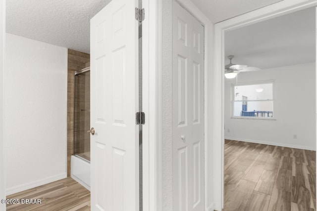 3807 S Atlantic Ave Unit 2020, Daytona Beach, FL 32118 - corridor featuring wood finished floors and baseboards