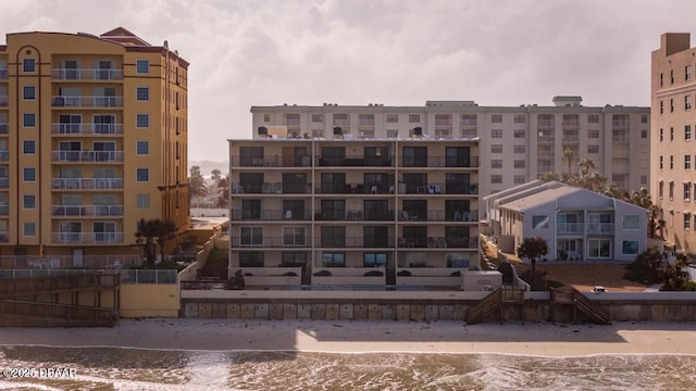3807 S Atlantic Ave Unit 2020, Daytona Beach, FL 32118 - view of apartment building / complex featuring view of water and beach