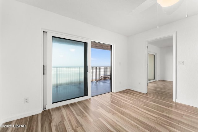 3807 S Atlantic Ave Unit 2020, Daytona Beach, FL 32118 - unfurnished room featuring light wood-style floors