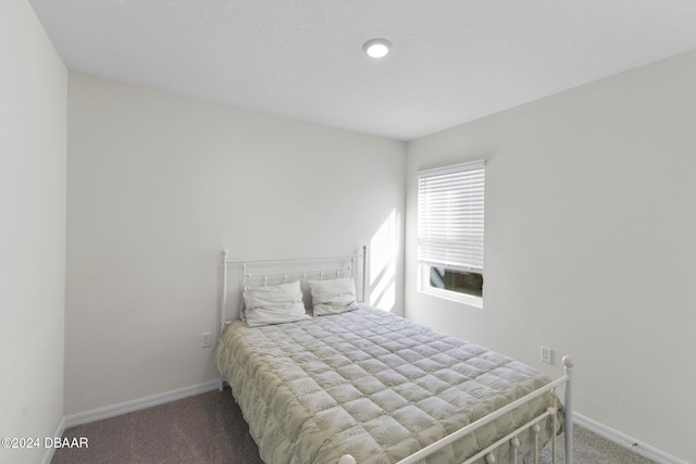 bedroom featuring carpet