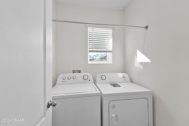 laundry room with washer and clothes dryer