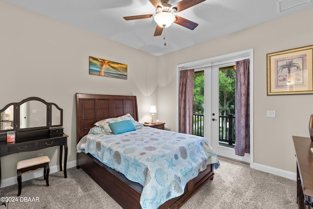 carpeted bedroom featuring access to exterior, french doors, and ceiling fan