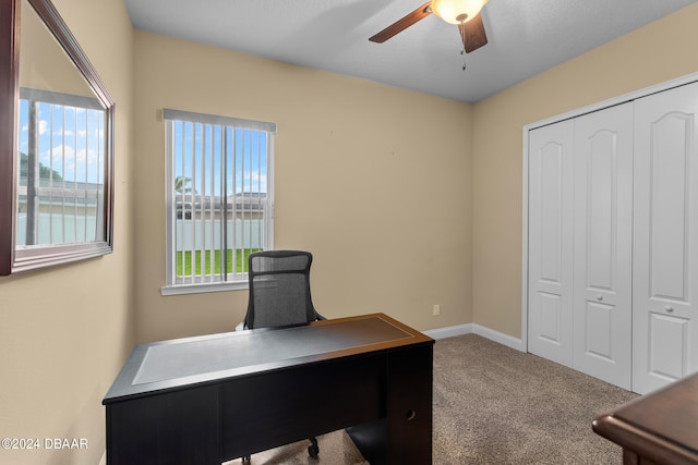 home office with carpet flooring and ceiling fan