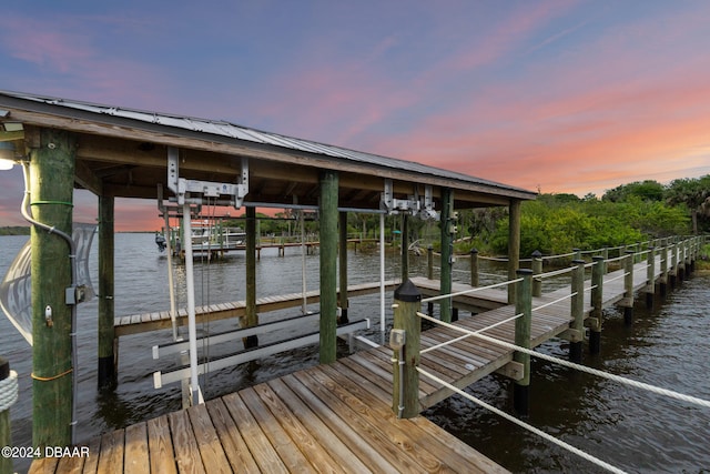 dock area featuring a water view