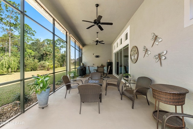 sunroom / solarium with ceiling fan