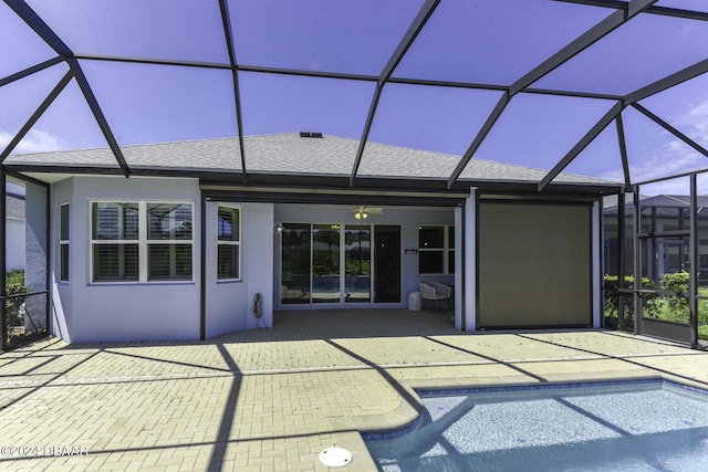 786 Jollymon Way, Daytona Beach, FL 32124 - back of property featuring a patio area, a shingled roof, and a lanai