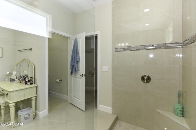 786 Jollymon Way, Daytona Beach, FL 32124 - bathroom featuring a tile shower, tile patterned floors, and baseboards