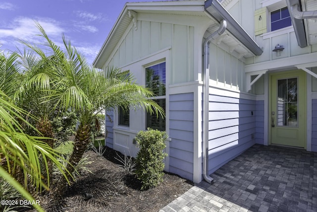 786 Jollymon Way, Daytona Beach, FL 32124 - view of side of home with board and batten siding