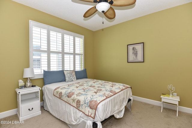 786 Jollymon Way, Daytona Beach, FL 32124 - bedroom featuring light colored carpet, baseboards, and a ceiling fan