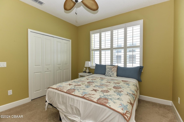 786 Jollymon Way, Daytona Beach, FL 32124 - bedroom featuring light carpet, a closet, baseboards, and a ceiling fan