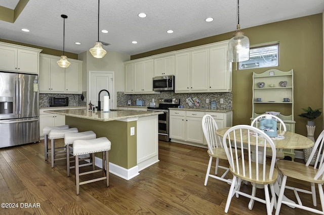 786 Jollymon Way, Daytona Beach, FL 32124 - kitchen featuring stainless steel appliances, a sink, dark wood-style flooring, white cabinets, and recessed lighting