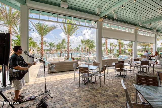 786 Jollymon Way, Daytona Beach, FL 32124 - view of patio with outdoor lounge area, fence, and outdoor dining space
