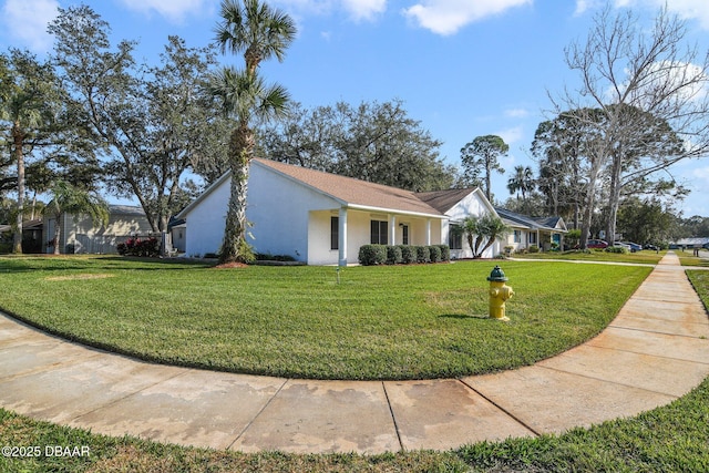 view of front of home with a front lawn