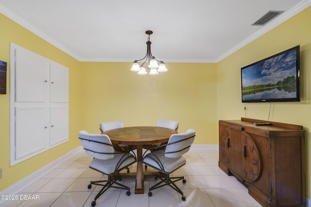 dining space featuring crown molding, a chandelier, and light tile patterned floors