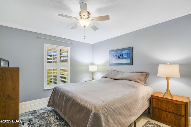 bedroom with crown molding, light tile patterned floors, and ceiling fan