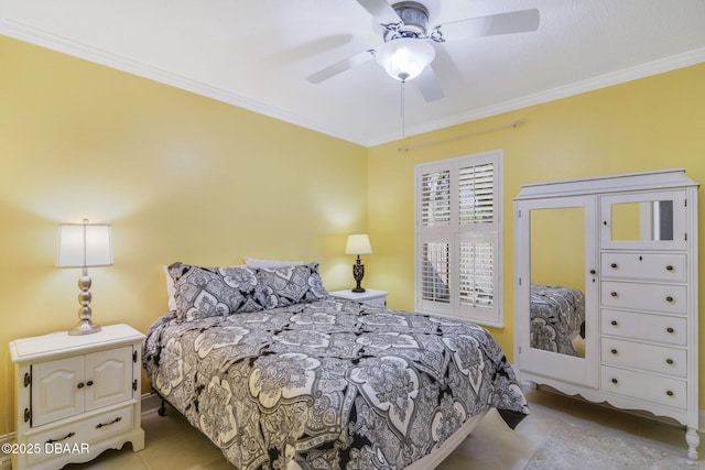 bedroom featuring crown molding and ceiling fan