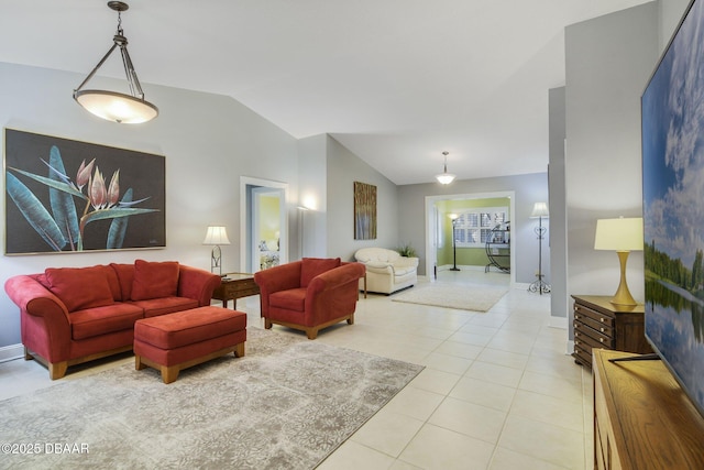 tiled living room with lofted ceiling