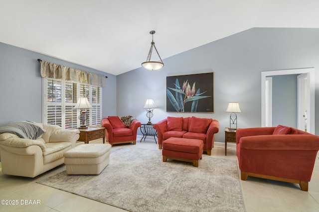 living room featuring lofted ceiling and tile patterned flooring