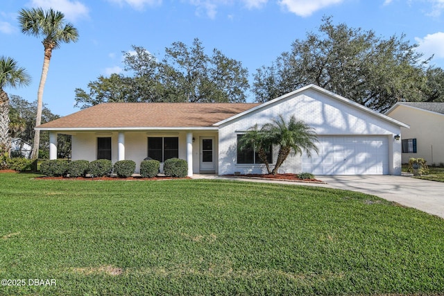 single story home featuring a garage and a front lawn