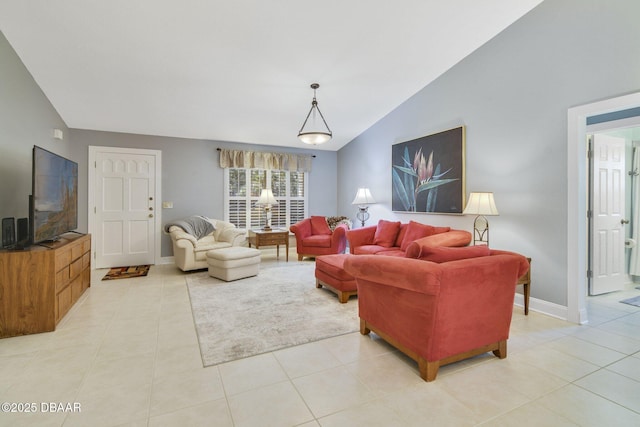 living room with light tile patterned flooring and lofted ceiling