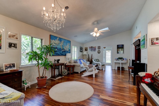 living room with lofted ceiling, dark hardwood / wood-style floors, and ceiling fan with notable chandelier