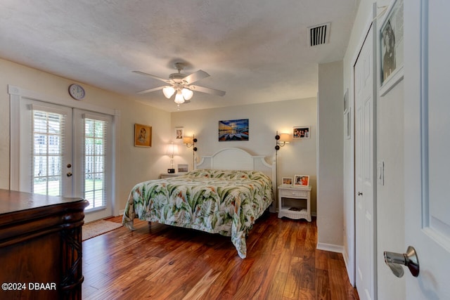 bedroom featuring hardwood / wood-style floors, ceiling fan, access to exterior, and french doors