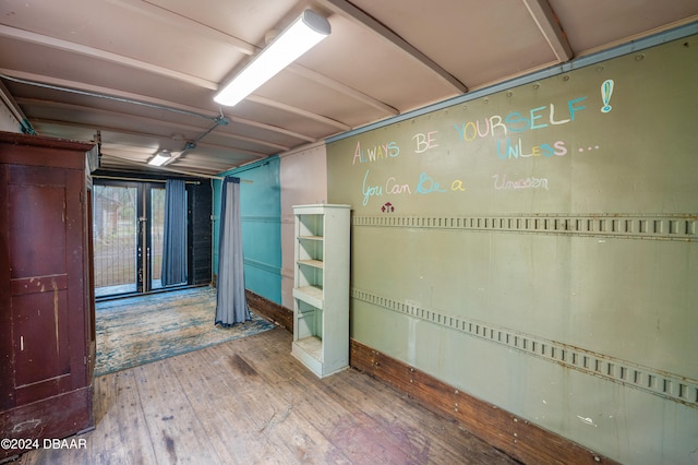 interior space with hardwood / wood-style flooring