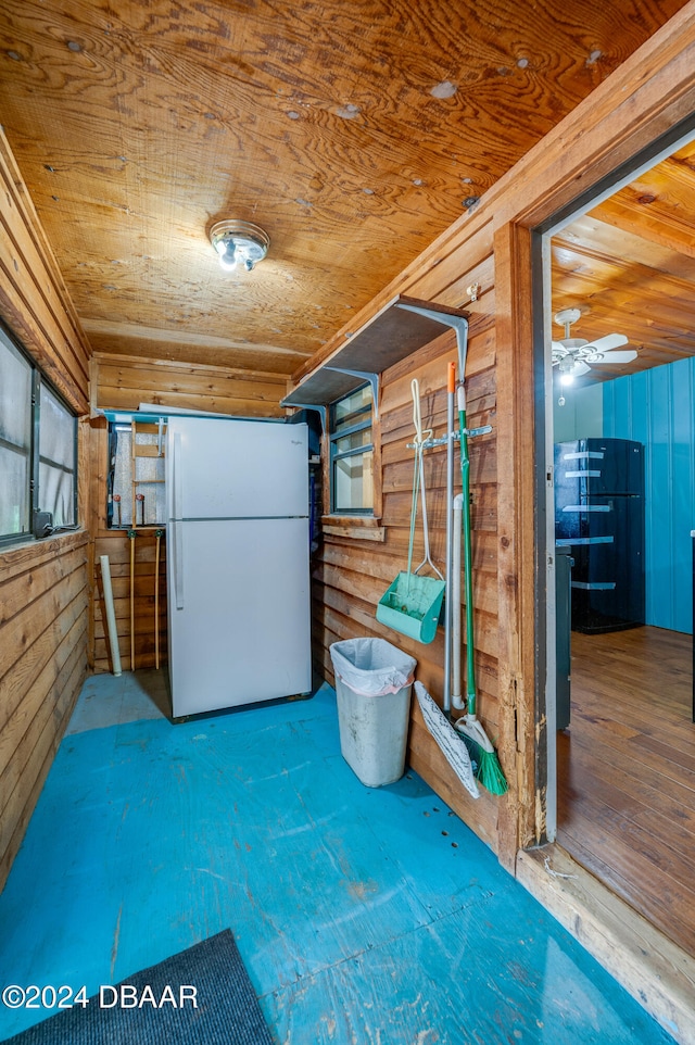 interior space featuring ceiling fan