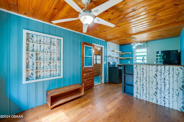 kitchen with wood ceiling, wood-type flooring, sink, and electric range