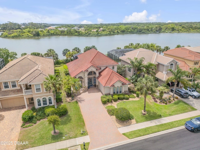 100 Emerald Lake Dr, Palm Coast, FL 32137 - aerial view of property and surrounding area featuring a large body of water