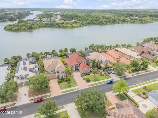 100 Emerald Lake Dr, Palm Coast, FL 32137 - aerial perspective of suburban area with a large body of water
