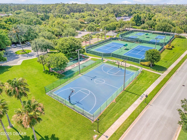 100 Emerald Lake Dr, Palm Coast, FL 32137 - view of basketball court featuring community basketball court and a wooded view