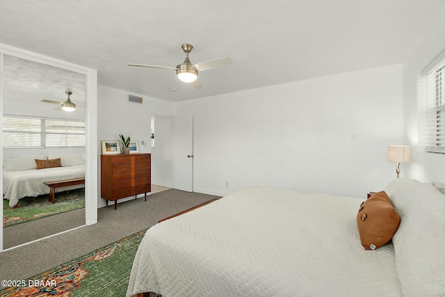 carpeted bedroom with ceiling fan