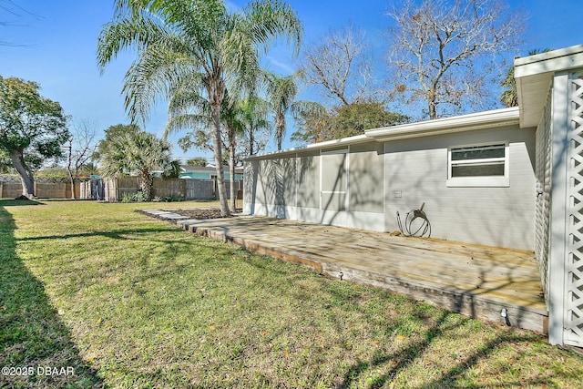 view of yard featuring a wooden deck