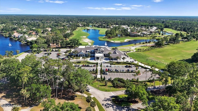 bird's eye view featuring a residential view, view of golf course, and a water view