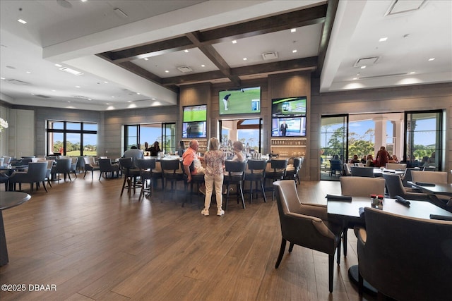 dining space with recessed lighting, visible vents, wood finished floors, and coffered ceiling