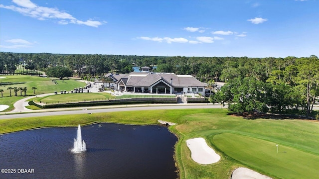 aerial view with a water view and golf course view