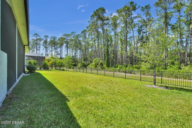 view of yard featuring fence