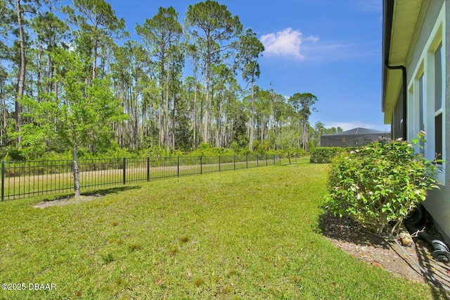 view of yard featuring fence