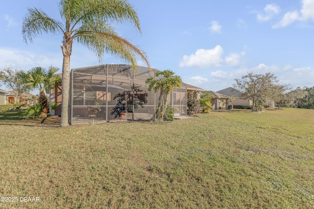 view of yard featuring glass enclosure