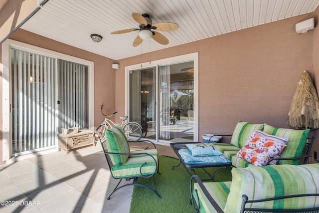 view of patio featuring an outdoor hangout area and ceiling fan