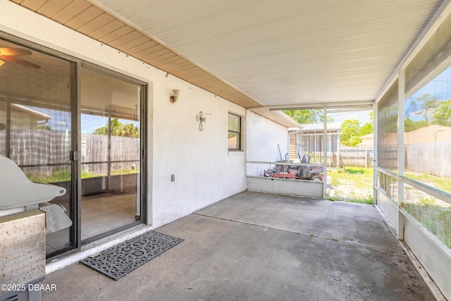 view of patio / terrace featuring fence