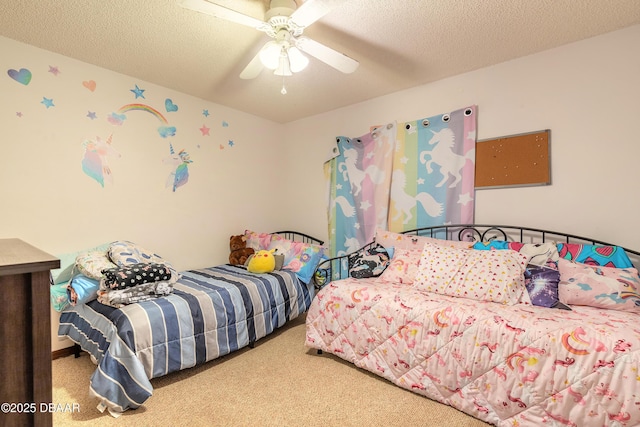 bedroom with carpet flooring, a textured ceiling, and ceiling fan
