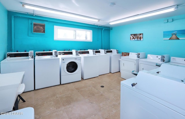 laundry area with separate washer and dryer