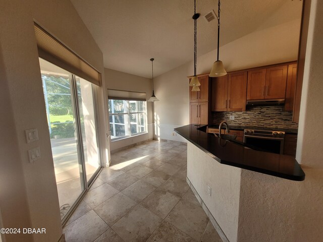 empty room featuring hardwood / wood-style floors, ceiling fan, and lofted ceiling