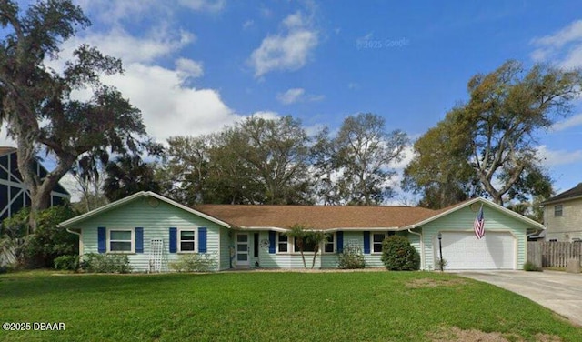 ranch-style house with a garage, fence, a front yard, and concrete driveway